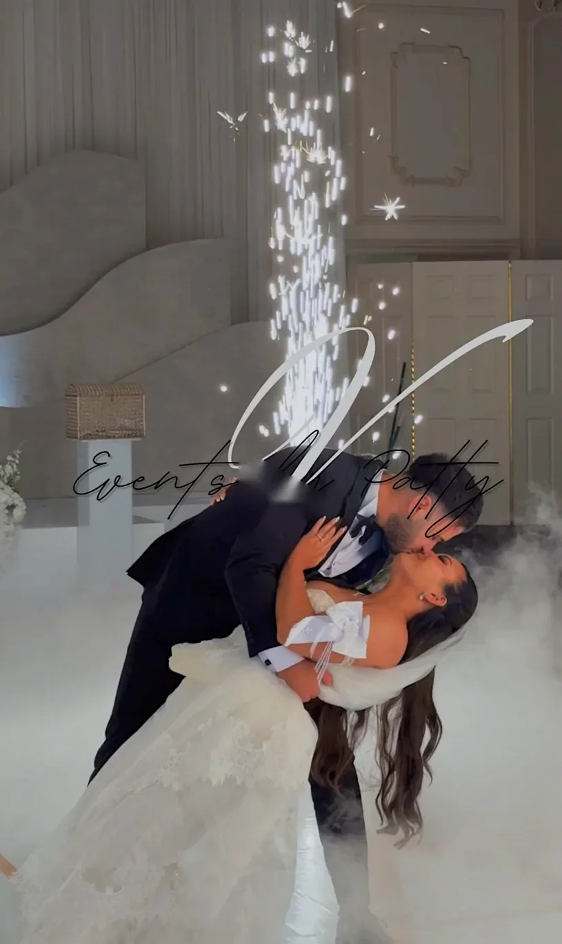 Couple's first dance with cold sparks and low fog